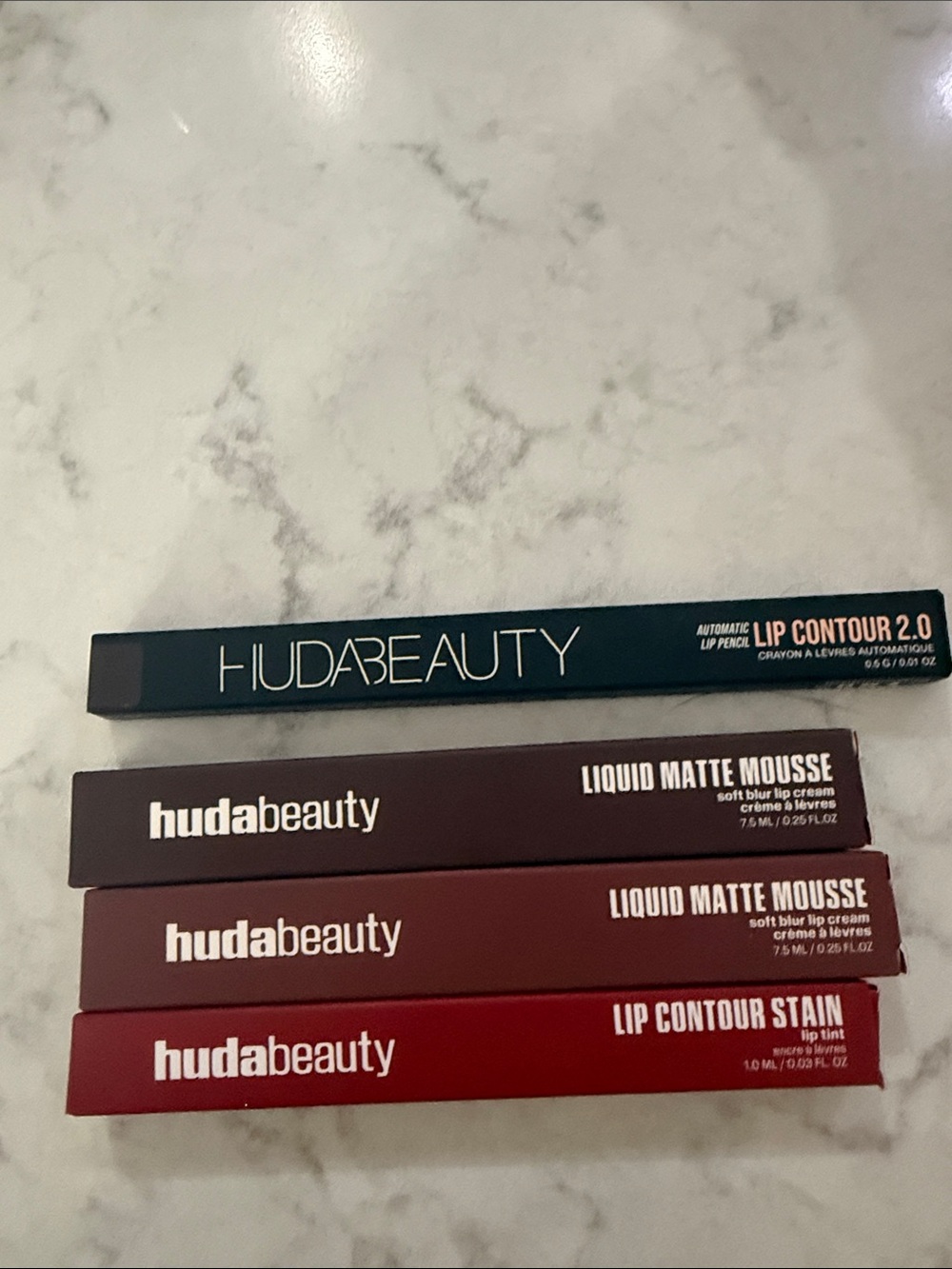Huda liquid mousse 2 Huda lip contour 1 Huda lip contour stain 1